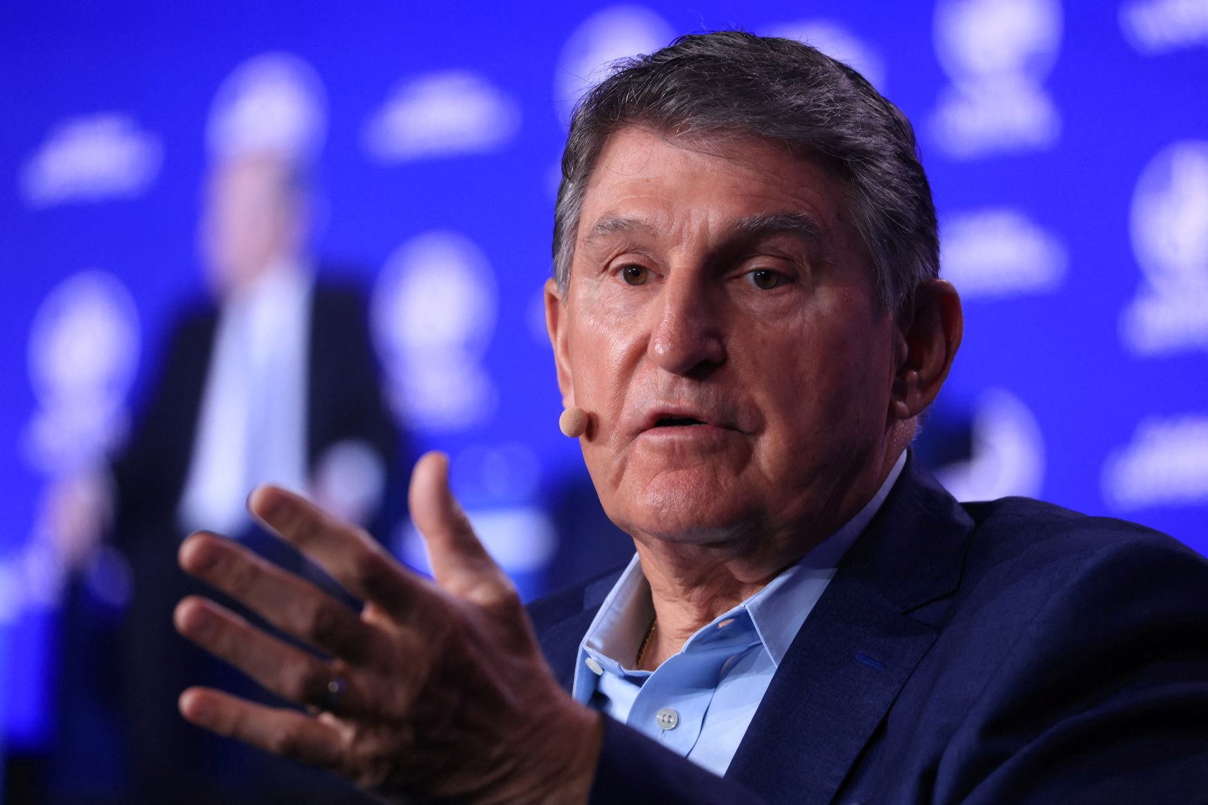 Joe Manchin speaks at a podium during the launch of the Independent Leadership Council