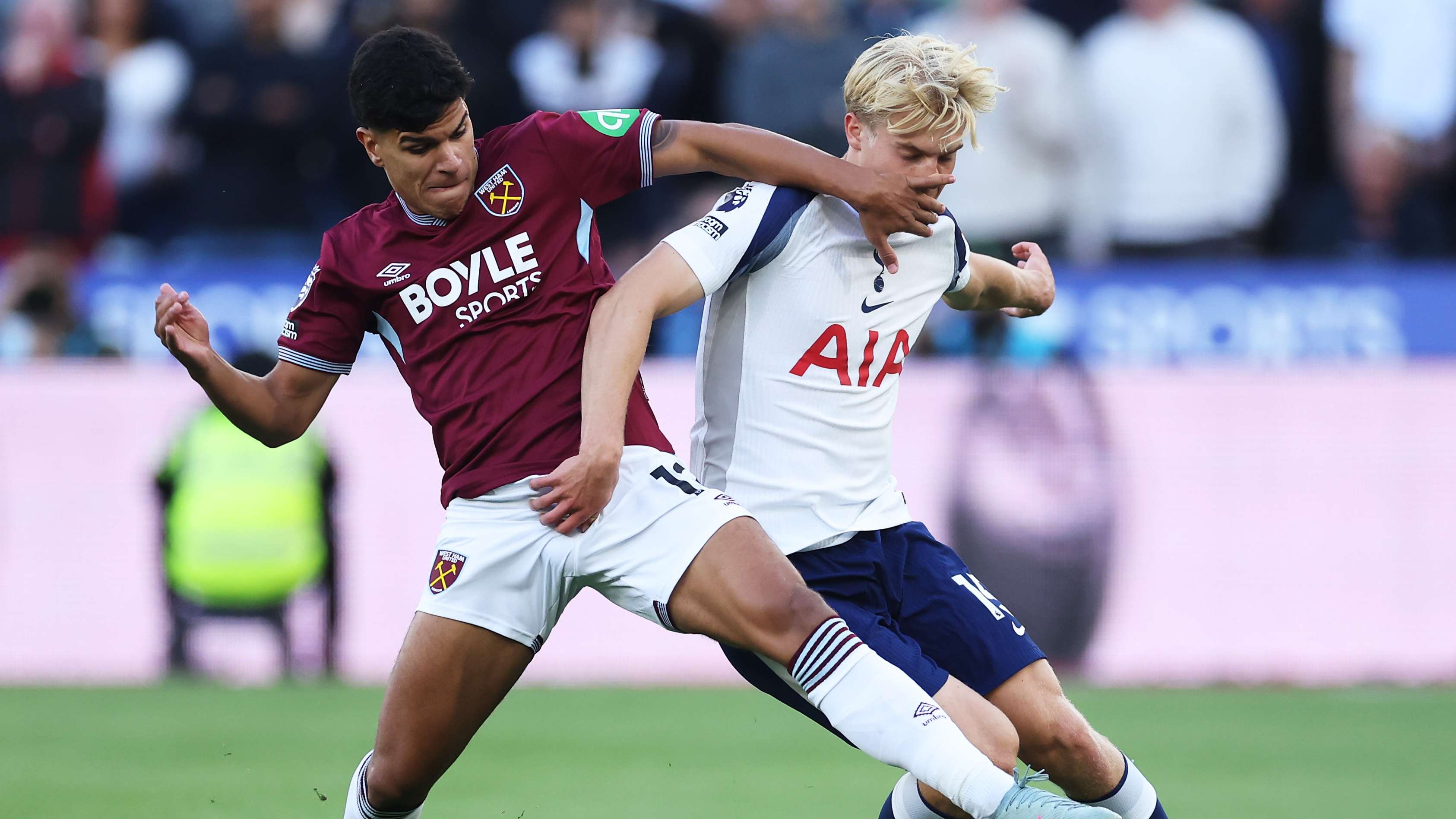 Mateus Fernandes of West Ham United battles with a Tottenham Hotspur player during the Premier League season