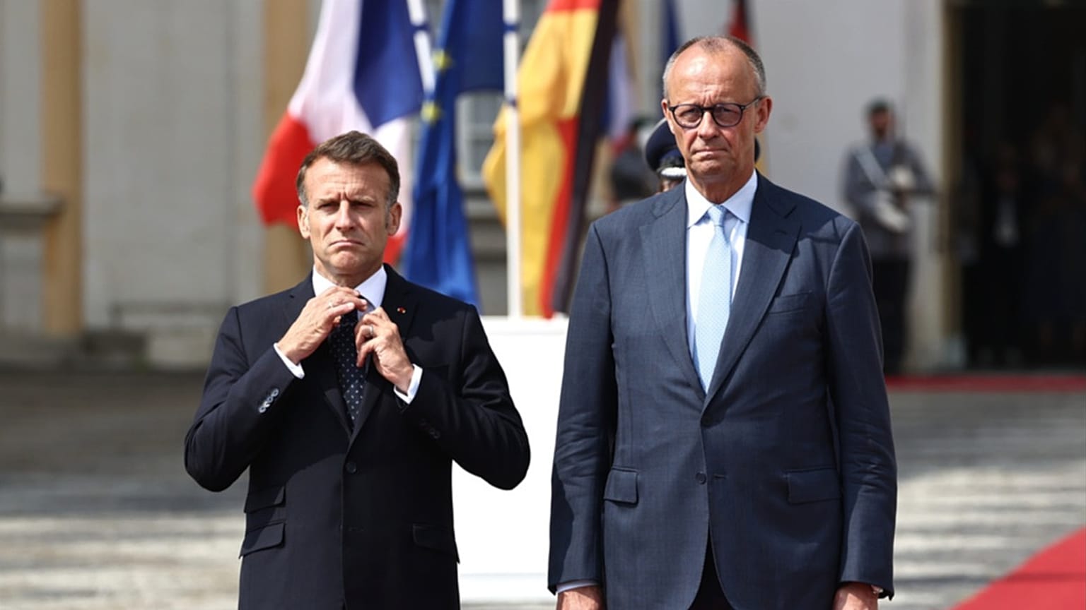 Friedrich Merz and Emmanuel Macron at Germany-France defense summit in Cologne