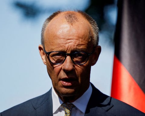 German Chancellor Friedrich Merz speaks at a press conference about NATO defence spending commitments