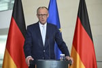 German Chancellor Friedrich Merz speaks at a press conference