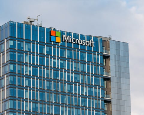 Microsoft logo with EU flag representing the company's EU Country-by-Country tax report revealing Ireland profit concentration