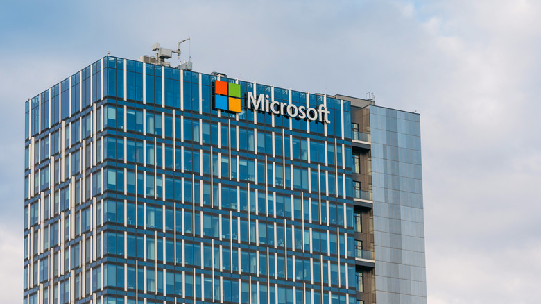 Microsoft logo with EU flag representing the company's EU Country-by-Country tax report revealing Ireland profit concentration