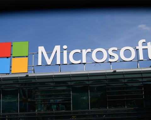 Microsoft logo at a corporate office building representing the launch of Microsoft Frontier Company in 2026