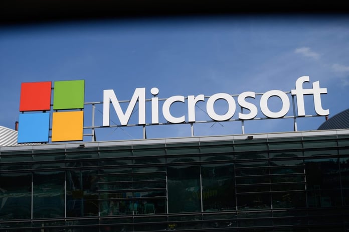 Microsoft logo at a corporate office building representing the launch of Microsoft Frontier Company in 2026