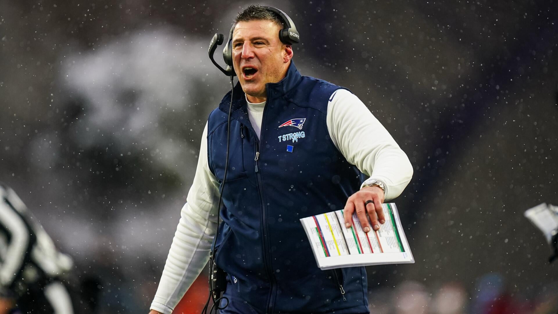 New England Patriots head coach Mike Vrabel calling plays from the sideline