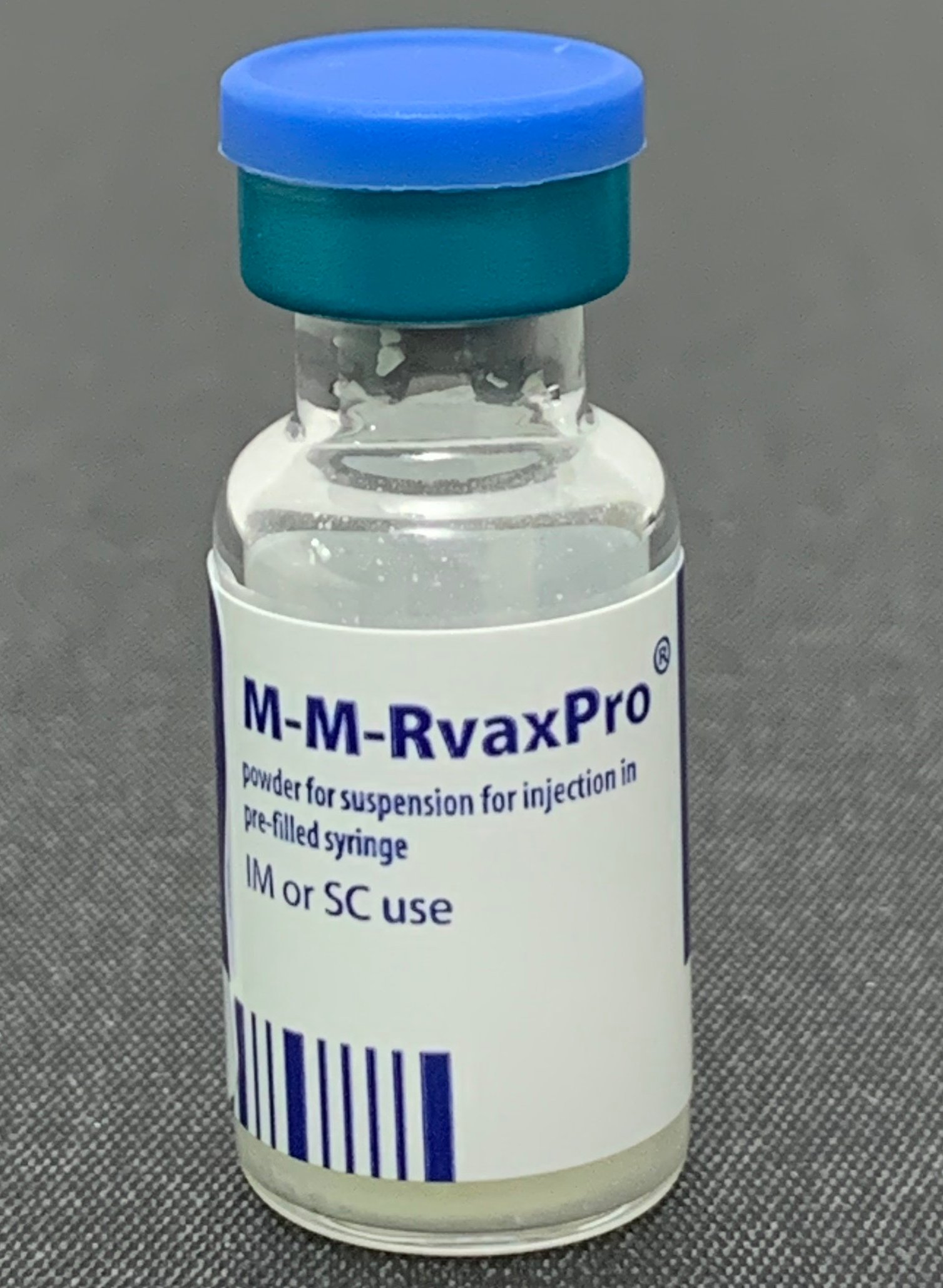 A pre-filled syringe and vial of measles, mumps and rubella vaccine