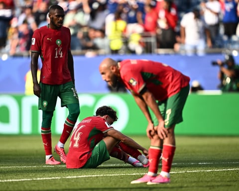 Morocco players react after being eliminated 2-0 by France in World Cup 2026 quarterfinal in Boston