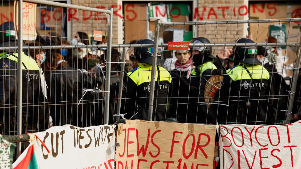 Pro-Palestinian demonstrators at the University of Amsterdam as the Netherlands moved to ban Israeli settlement imports