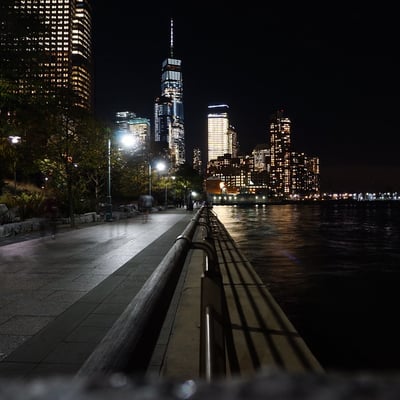 New York City skyline at night with One World Trade Center, site of the Kalshi illegal gambling lawsuit