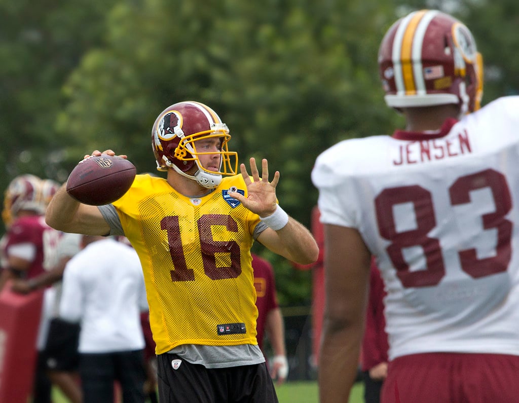 NFL quarterback football team training camp practice offense players