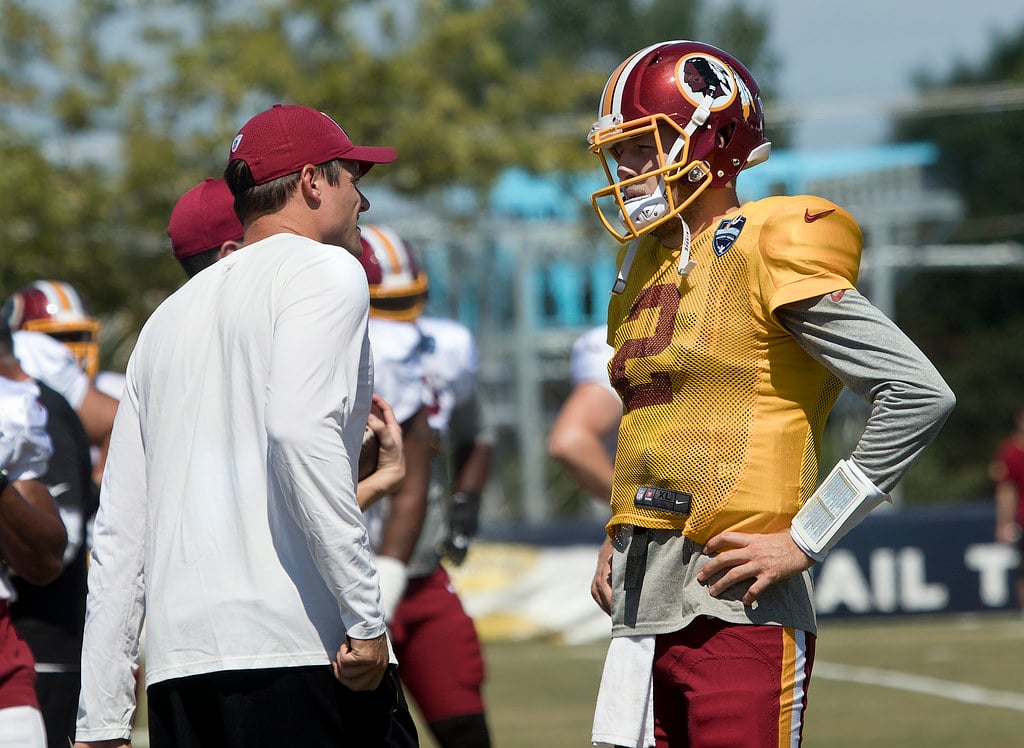 NFL football players training camp practice session on field