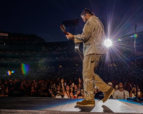 Noah Kahan performing at Fenway Park during The Great Divide Tour in July 2026