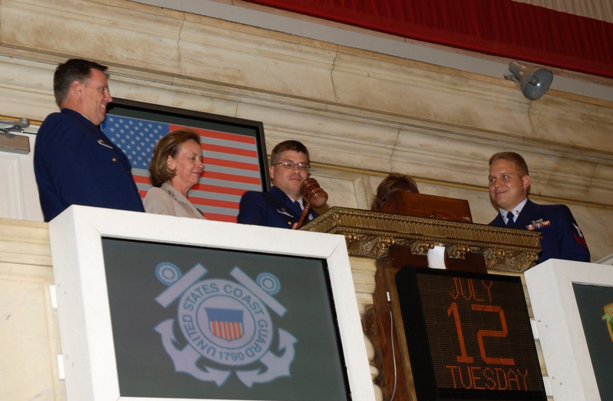 The closing gavel raps to end the trading day on the floor of the New York Stock Exchange