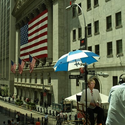 NYSE trading floor with traders and market screens representing Goldman Sachs private markets platform