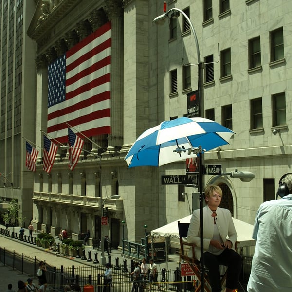 NYSE trading floor with traders and market screens representing Goldman Sachs private markets platform