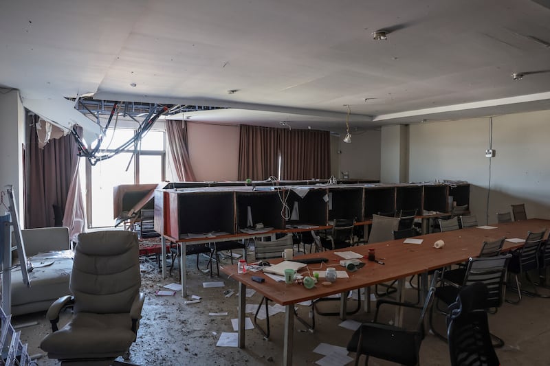 Rows of small acoustic foam phone booths inside the O'Smach scam compound in Cambodia used by trafficking victims forced into cyber fraud operations