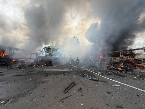 Firefighters extinguish a fire after a Russian strike on Odessa on July 13, 2026.