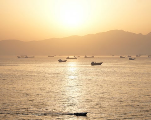 Oil tankers transit the Strait of Hormuz as Brent crude falls to its lowest since the Iran war began