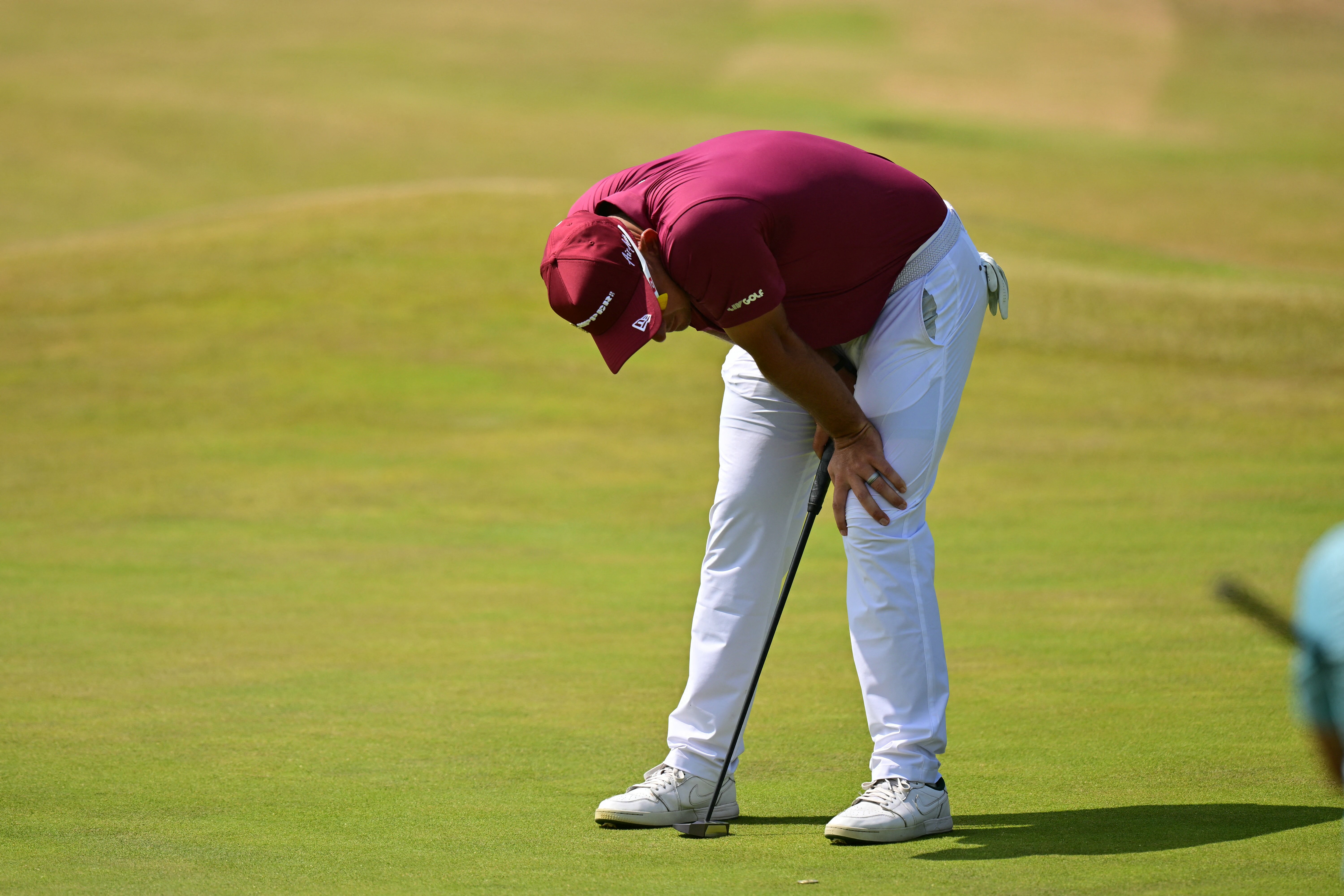 Lucas Herbert reacts on the 18th green at Royal Birkdale after missing his putt for what would have been the first 61 in major championship history