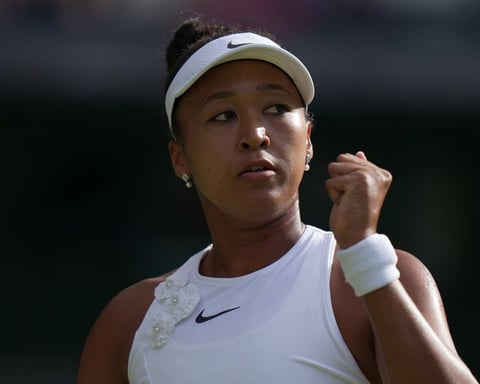 Naomi Osaka celebrates after beating Aryna Sabalenka at Wimbledon 2026