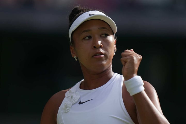 Naomi Osaka celebrates after beating Aryna Sabalenka at Wimbledon 2026