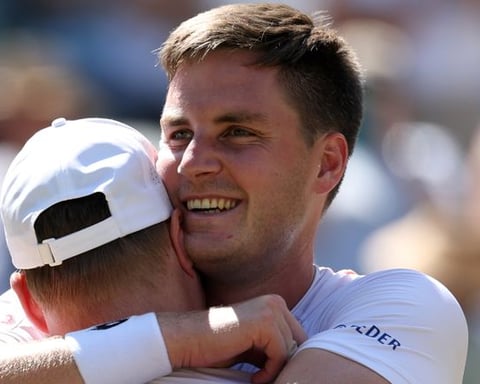 Henry Patten and Harri Heliovaara celebrate winning the Wimbledon men's doubles title 2026