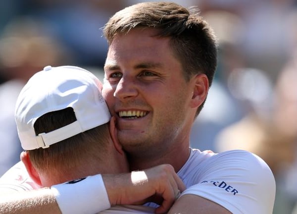 Henry Patten and Harri Heliovaara celebrate winning the Wimbledon men's doubles title 2026
