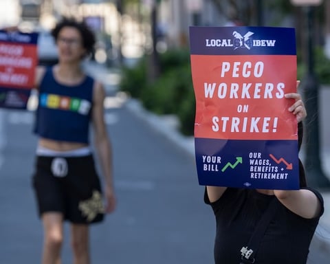 IBEW Local 614 members strike outside PECO headquarters in Philadelphia July 2026