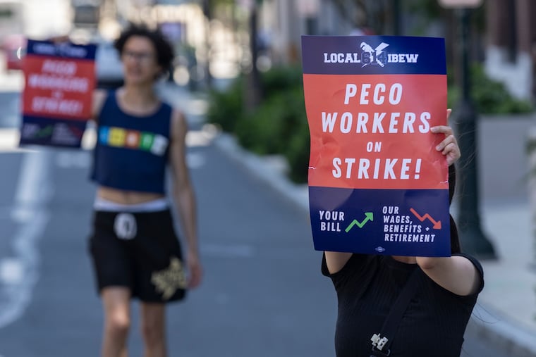 IBEW Local 614 members strike outside PECO headquarters in Philadelphia July 2026