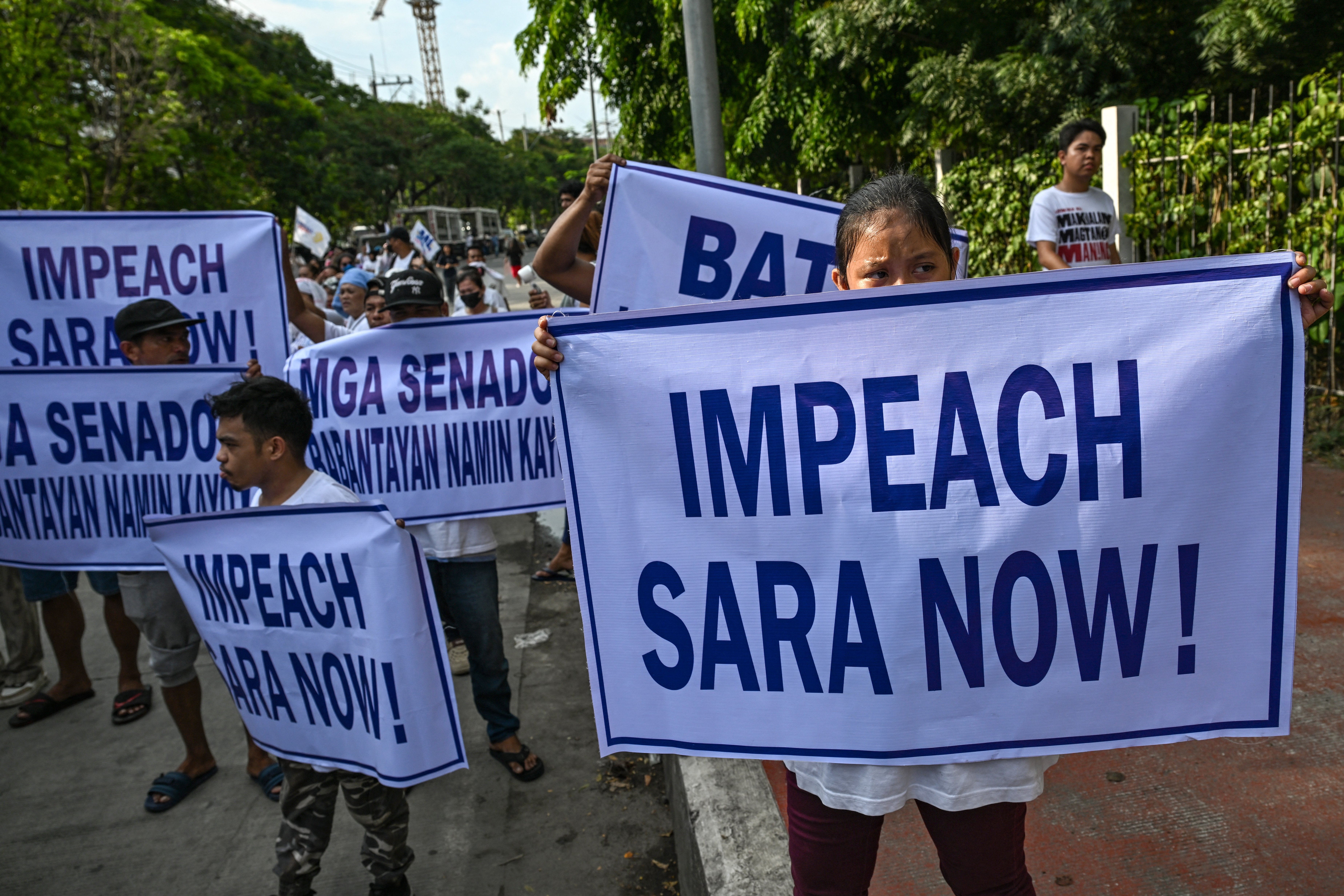 Protesters outside Philippine Senate Pasay Metro Manila demanding Sara Duterte impeachment trial 2026