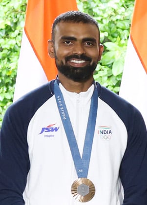 PR Sreejesh, former India goalkeeper and outgoing junior hockey coach, with his Paris Olympics bronze medal