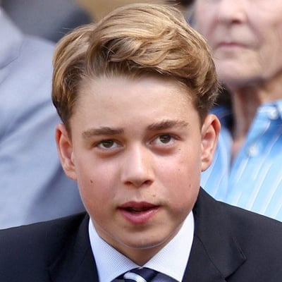 Prince George smiles in a portrait photograph taken at Kensington Palace for his 13th birthday