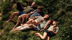 Prince William and Princess Kate with their three children in a summer family photo from their Instagram summer rewind post