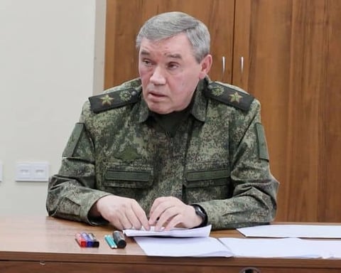 Russian President Vladimir Putin receives a briefing from Chief of the General Staff Valery Gerasimov at an army command centre