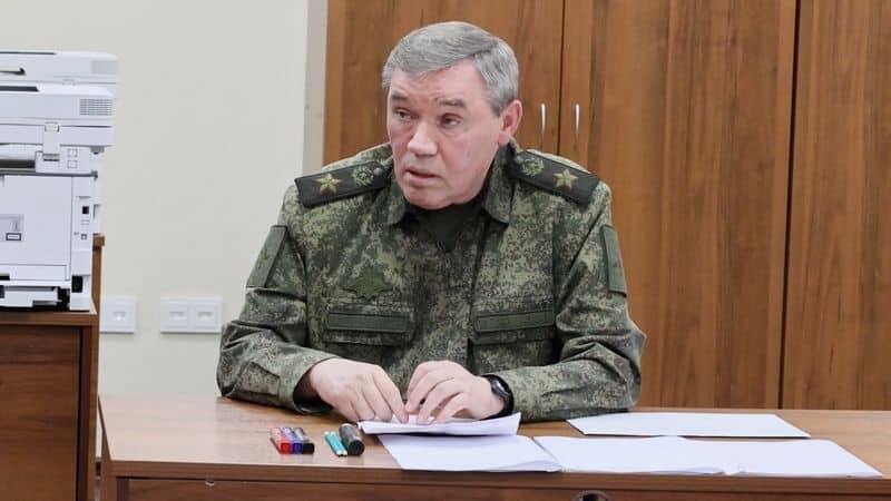 Russian President Vladimir Putin receives a briefing from Chief of the General Staff Valery Gerasimov at an army command centre