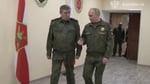 Russian President Vladimir Putin speaks with Chief of the General Staff Valery Gerasimov at a command post during the Russian military operation in Ukraine