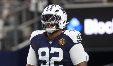 Dallas Cowboys defensive tackle Quinnen Williams warming up before an NFL game at AT&T Stadium