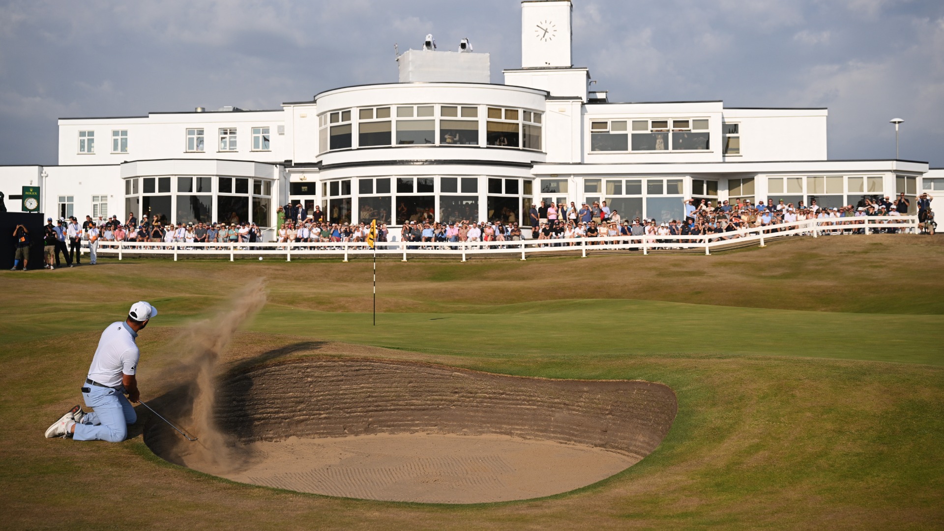 Jon Rahm plays from a bunker during the 154th Open Championship at Royal Birkdale Golf Club, Southport, England.