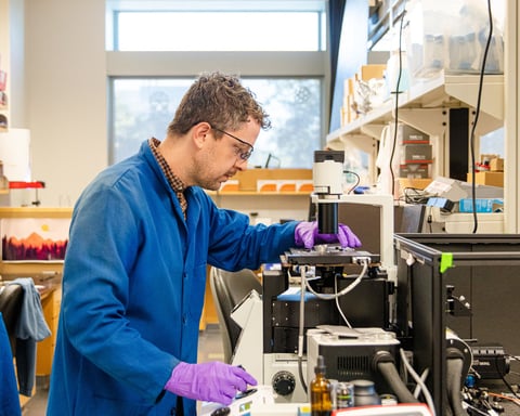 Dr. Randy Carney uses a Raman microscope to study nanoplastics at UC Davis