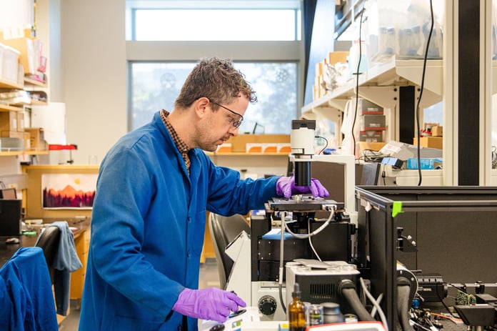 Dr. Randy Carney uses a Raman microscope to study nanoplastics at UC Davis