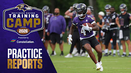 Baltimore Ravens players running drills at training camp in Owings Mills 2026
