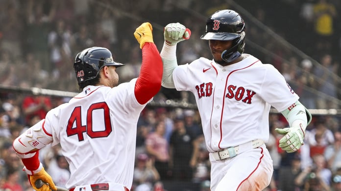Ceddanne Rafaela celebrates with Willson Contreras as Red Sox tie 1946 franchise record