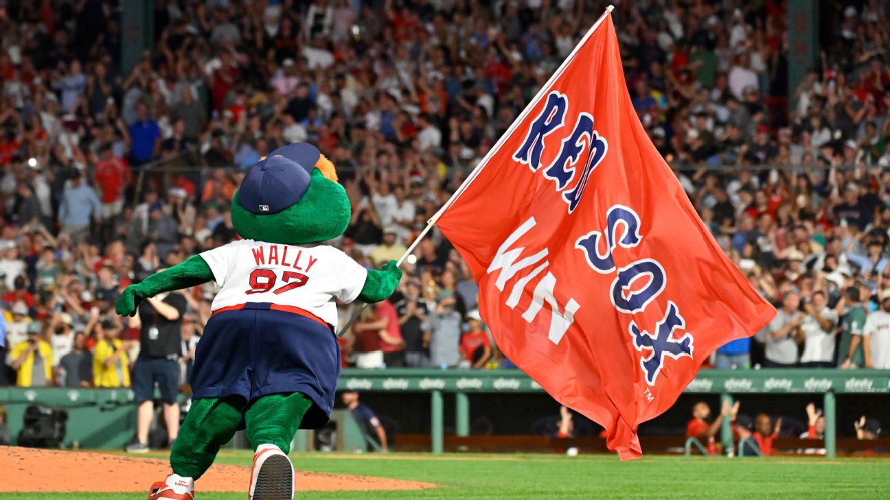 Boston Red Sox players celebrate during their record-tying 15-game winning streak