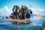Rohingya refugees on a crowded boat in the Bay of Bengal off the coast of Myanmar