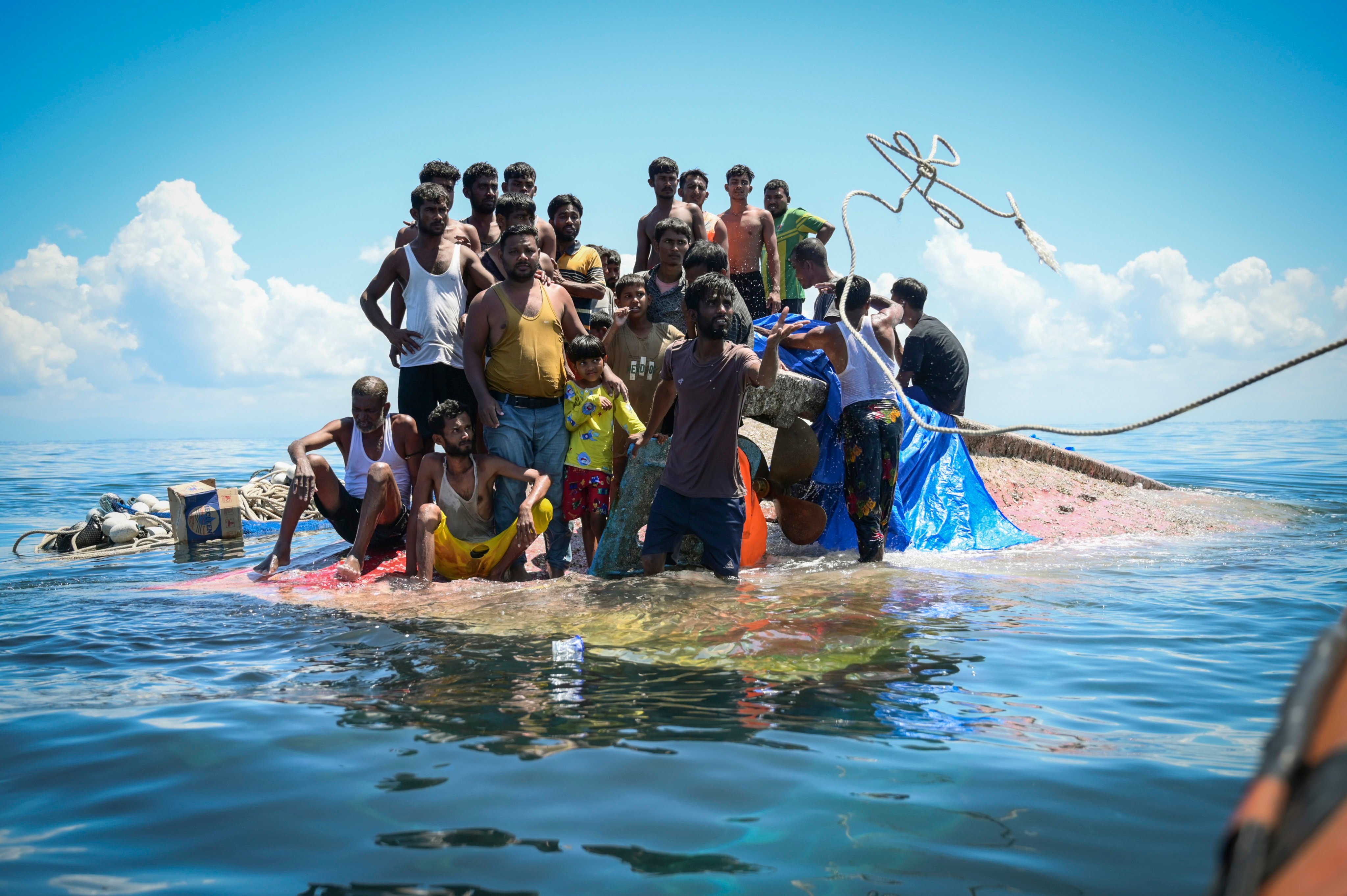 Rohingya refugees on a crowded boat in the Bay of Bengal off the coast of Myanmar