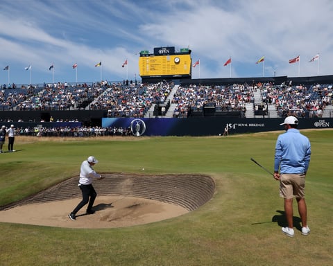 Golfer plays from a bunker at Royal Birkdale during the Local Qualifying Competition for The Open Championship 2026