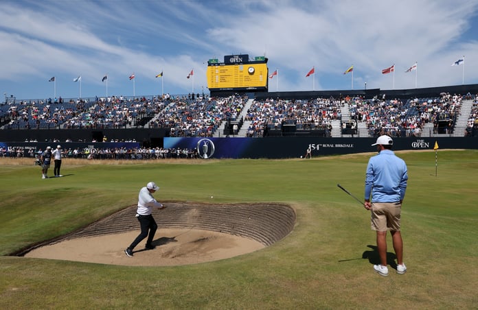 Golfer plays from a bunker at Royal Birkdale during the Local Qualifying Competition for The Open Championship 2026