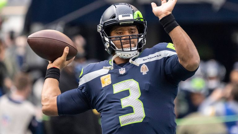 Russell Wilson in his NFL uniform representing the Seattle Seahawks championship era that Vinod Khosla is now purchasing