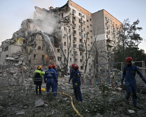 Rescuers work at a building damaged in a Russian missile strike in Kyiv Ukraine July 2 2026